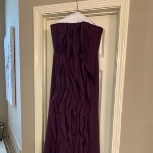 Formal floor length plum chiffon strapless dress.